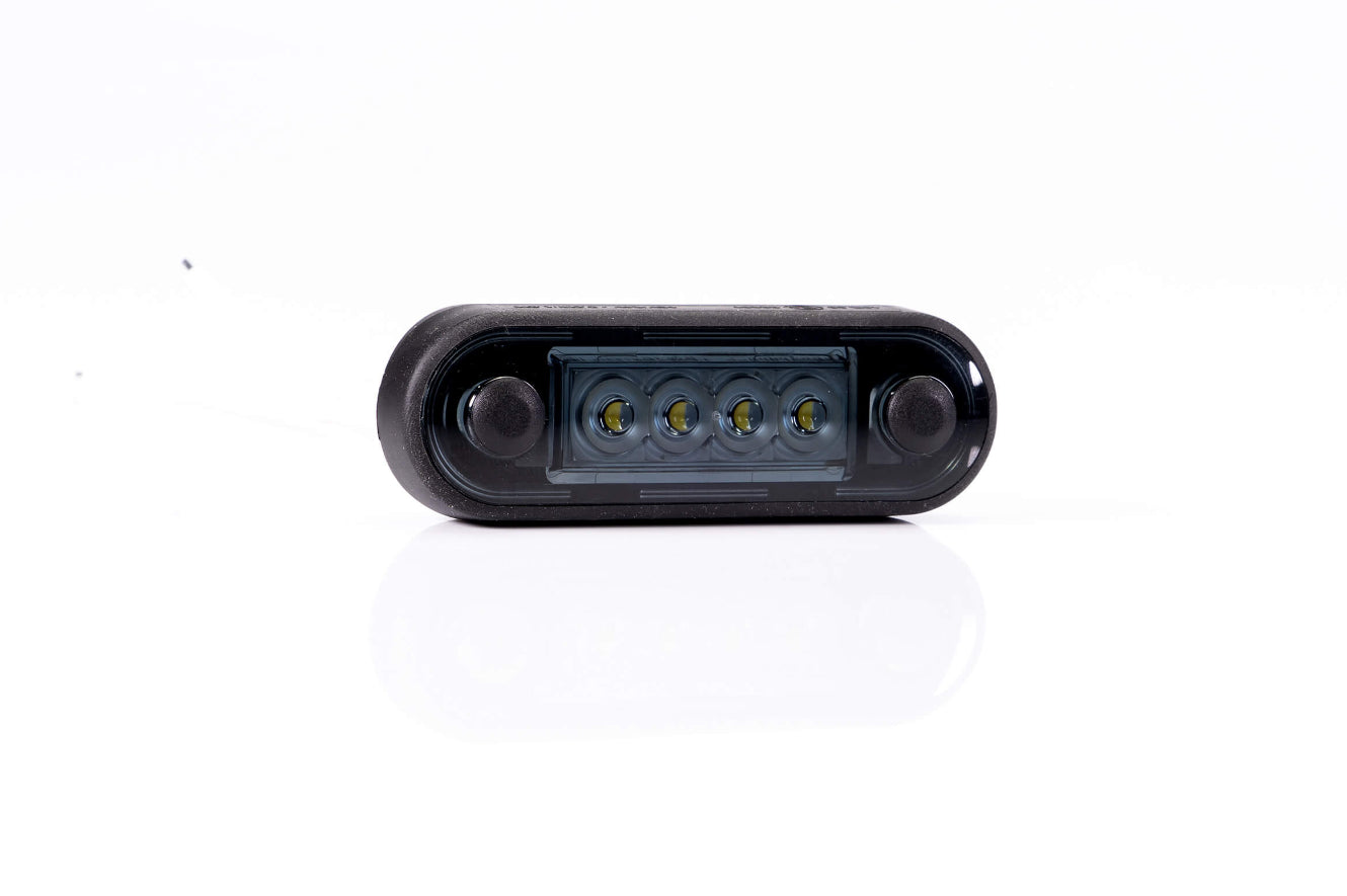 Clearance Lamp LED 12-36V, RED, DARK version, loom 0,15 m, with a flat and round black rubber gasket for a vehicle bullbars.